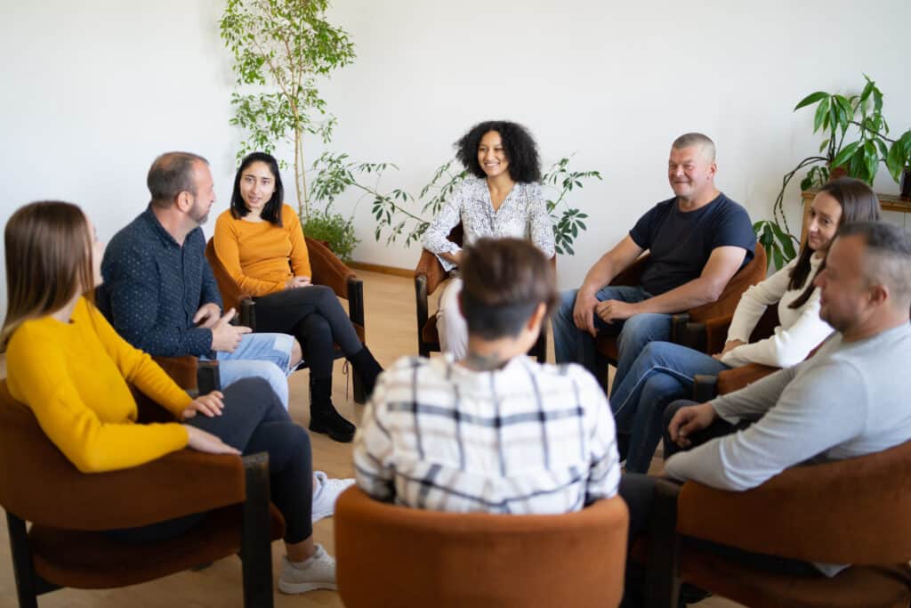 A therapy group having a discussion