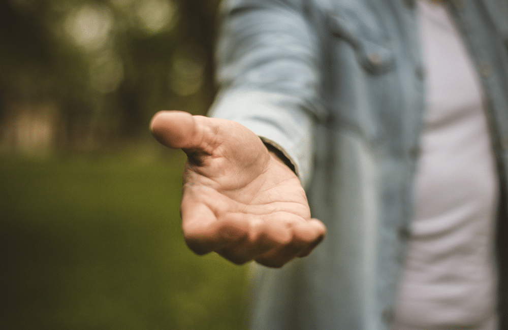 Close up view of hand reaching out